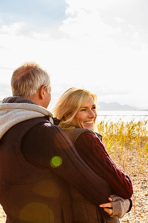 simsearch:649-08239088,k - Mature couple, outdoors, hugging, smiling, rear view Stock Photo - Premium Royalty-Free, Code: 649-09209273
