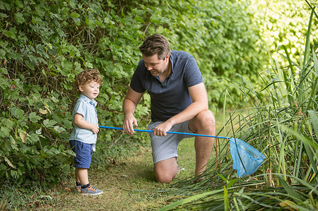 simsearch:649-07437107,k - Father and child with fishing net in park Stock Photo - Premium Royalty-Free, Code: 649-09212820