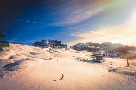 simsearch:649-03857163,k - Skier on snow covered slopes, Madonna di Campiglio, Trentino-Alto Adige, Italy Stock Photo - Premium Royalty-Free, Code: 649-09213308