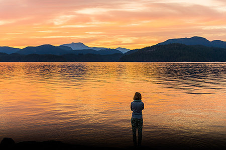 simsearch:649-08924209,k - Young woman looking out at sunset, Quadra Island, Campbell River, Canada Stock Photo - Premium Royalty-Free, Code: 649-09213592