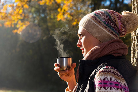 simsearch:649-07279678,k - Woman having warm drink in autumnal forest Stock Photo - Premium Royalty-Free, Code: 649-09245696