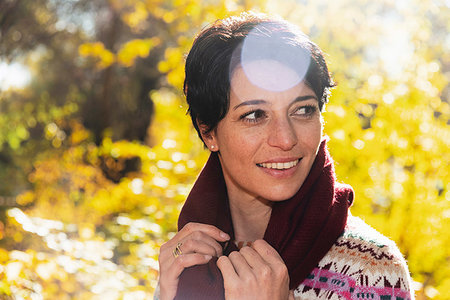 simsearch:649-07279678,k - Smiling woman in autumnal forest Stock Photo - Premium Royalty-Free, Code: 649-09245714