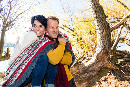 simsearch:649-07279678,k - Couple wrapped in blanket in park, Strandbad, Mannheim, Germany Stock Photo - Premium Royalty-Free, Code: 649-09245713