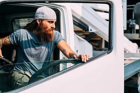 self-employed (male) - Man coming out of commercial vehicle Stock Photo - Premium Royalty-Free, Code: 649-09246455