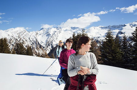 simsearch:649-08924209,k - Teenage girl with mother and sisters snowshoeing in snow covered mountain, Styria, Tyrol, Austria Stock Photo - Premium Royalty-Free, Code: 649-09258162