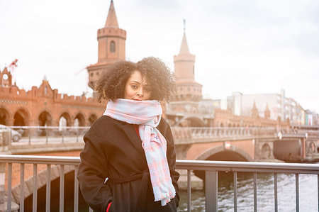 simsearch:649-08922723,k - Mid adult woman in scarf on Oberbaum Bridge, portrait, Berlin, Germany Stock Photo - Premium Royalty-Free, Code: 649-09250337