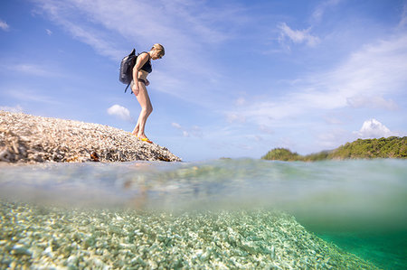 simsearch:649-08900720,k - Woman exploring seaside, Ginto island, Linapacan, Philippines Stock Photo - Premium Royalty-Free, Code: 649-09251318