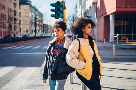 simsearch:649-07736862,k - Two cool young women standing on city street Stock Photo - Premium Royalty-Free, Code: 649-09268937