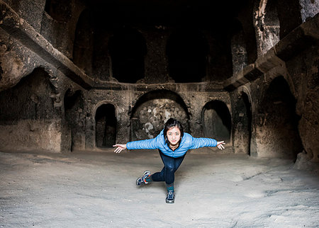 simsearch:700-08743683,k - Woman practising yoga in Selime Monastery, Göreme, Cappadocia, Nevsehir, Turkey Stock Photo - Premium Royalty-Free, Code: 649-09276039