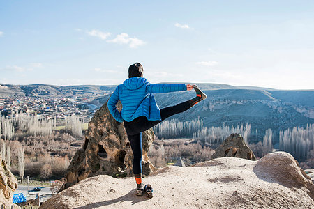 simsearch:640-03265635,k - Woman practising yoga in Selime Monastery, Göreme, Cappadocia, Nevsehir, Turkey Stock Photo - Premium Royalty-Free, Code: 649-09276043