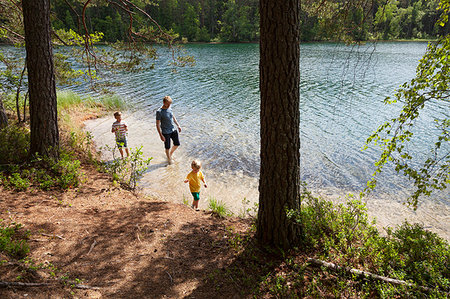 simsearch:649-08004031,k - Father and sons playing near lake, Finland Stock Photo - Premium Royalty-Free, Code: 649-09277536