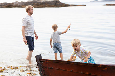 simsearch:649-07761212,k - Father and sons playing beside boat moored on beach, Norway Stock Photo - Premium Royalty-Free, Code: 649-09277598