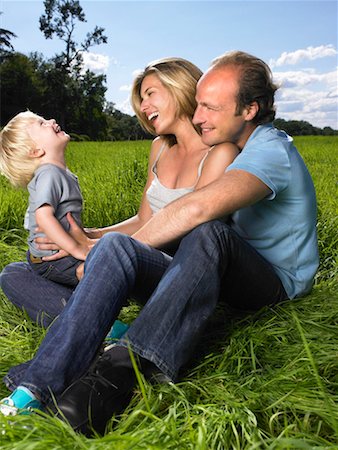 simsearch:649-01696405,k - Family enjoying a good time in a field. Stock Photo - Premium Royalty-Free, Code: 649-01754356