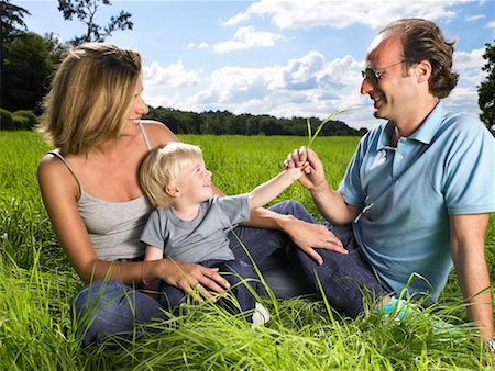 simsearch:649-01696405,k - Family enjoying a good time in a field. Stock Photo - Premium Royalty-Free, Code: 649-01754352