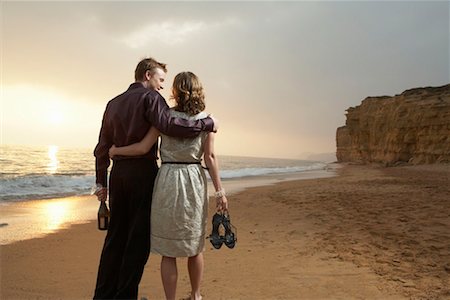 simsearch:649-01696405,k - Couple walking together on beach. Stock Photo - Premium Royalty-Free, Code: 649-01755382