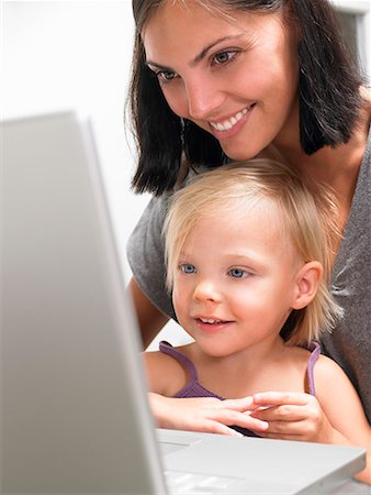 simsearch:649-06304951,k - Mother and daughter looking at a laptop Stock Photo - Premium Royalty-Free, Code: 649-02054350