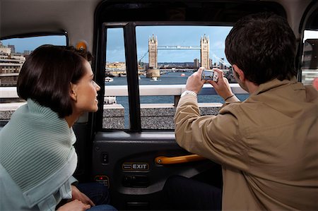 simsearch:673-03405645,k - Couple in taxi, view of Tower Bridge Stock Photo - Premium Royalty-Free, Code: 649-02054560