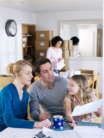 daughter sitting on dad lap - Working from home family take a break Stock Photo - Premium Royalty-Free, Code: 649-02055163