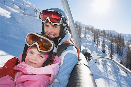 Young girl and grandmother on chair lift Stock Photo - Premium Royalty-Free, Code: 649-02053497