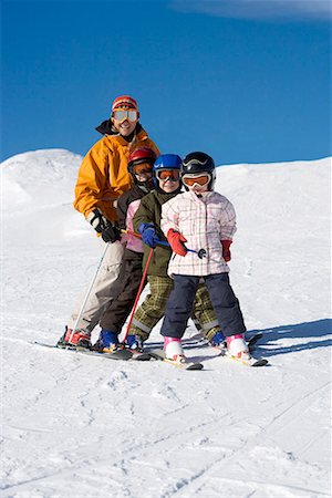 simsearch:649-06716505,k - Mother skiing with children Stock Photo - Premium Royalty-Free, Code: 649-02053525