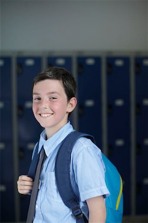 private school with uniforms - School boy holding backpack Stock Photo - Premium Royalty-Free, Code: 649-02199356