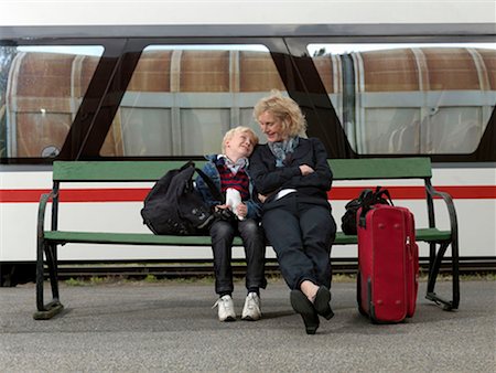 people waiting at train station - Grandmother and grandson on train station Stock Photo - Premium Royalty-Free, Code: 649-02199459