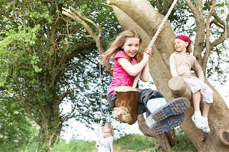 simsearch:649-07647801,k - Young girl on rope swing Stock Photo - Premium Royalty-Free, Code: 649-02199566