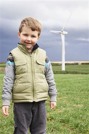 Boy on a wind farm Stock Photo - Premium Royalty-Free, Code: 649-02199587