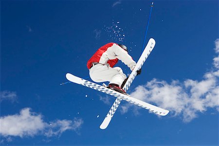 simsearch:649-06622380,k - Skier performing jumping trick Foto de stock - Sin royalties Premium, Código: 649-02290289