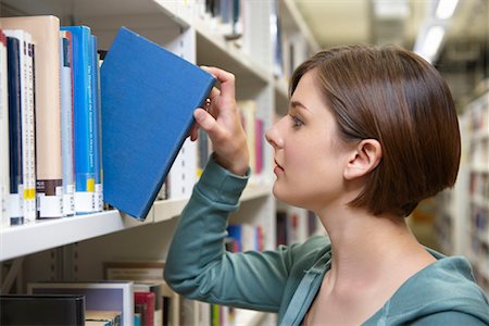 progress - Young woman with library book Stock Photo - Premium Royalty-Free, Code: 649-02290524