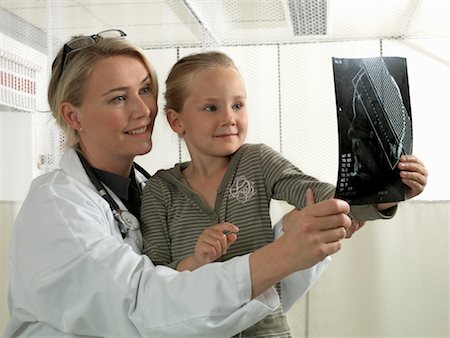 radiology patient - Doctor and girl with x-ray Stock Photo - Premium Royalty-Free, Code: 649-02348500