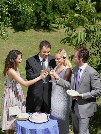 simsearch:649-06432569,k - Wedding party toasting the couple Foto de stock - Sin royalties Premium, Código: 649-02424431