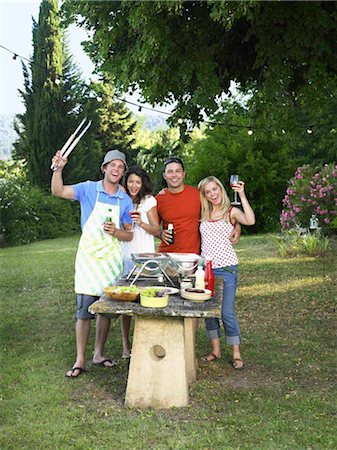 Friends celebrating at barbecue Stock Photo - Premium Royalty-Free, Code: 649-02424543