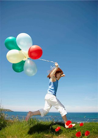 simsearch:649-03009497,k - Young girl running with balloons Stock Photo - Premium Royalty-Free, Code: 649-02423953