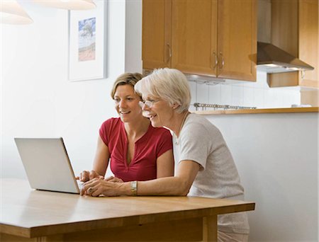 Women working on computer Stock Photo - Premium Royalty-Free, Code: 649-02665387