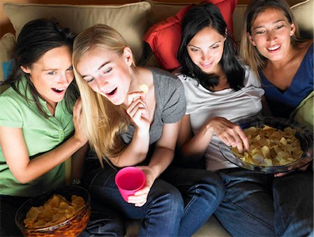 Women watching television Stock Photo - Premium Royalty-Free, Code: 649-02666272