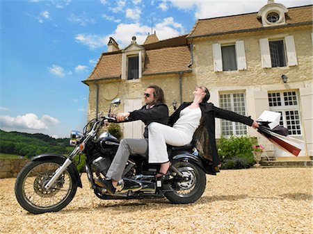 simsearch:614-06896253,k - Couple on motorbike Stock Photo - Premium Royalty-Free, Code: 649-02666454