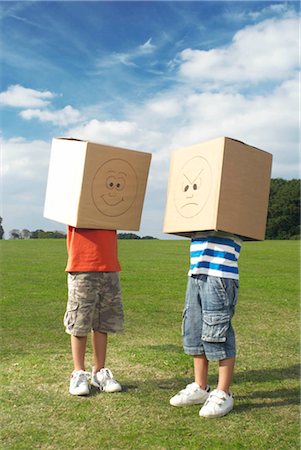 simsearch:649-06623087,k - boys with boxes over heads Stock Photo - Premium Royalty-Free, Code: 649-02666844