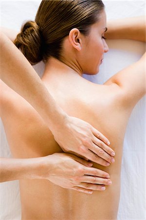 Woman's back being massaged Stock Photo - Premium Royalty-Free, Code: 649-02731231