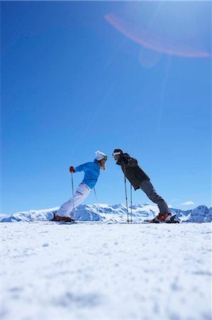 simsearch:649-05555429,k - Couple skiing on top of mountain Stock Photo - Premium Royalty-Free, Code: 649-02732577