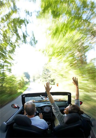 simsearch:649-07438003,k - Mature couple driving sports car Stock Photo - Premium Royalty-Free, Code: 649-02732612