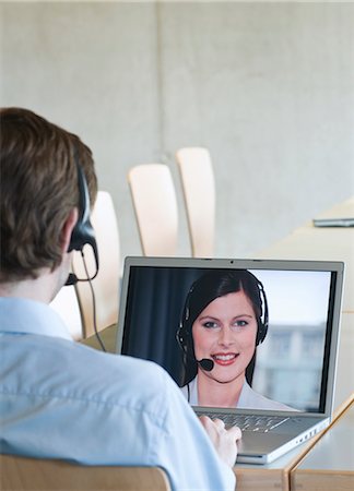 simsearch:649-06041170,k - Businessman video calling colleague Stock Photo - Premium Royalty-Free, Code: 649-03008486