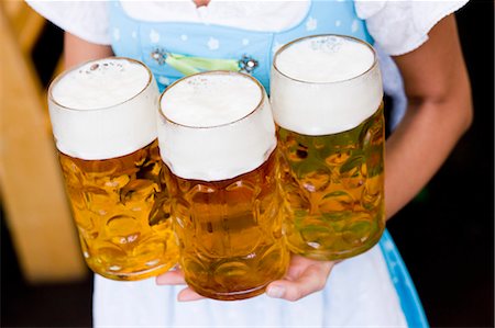 Young Woman With Glasses Beer Close Up Stock Photo - Premium Royalty-Free, Code: 649-03008641