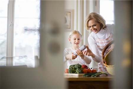 mother and daughter cooking Stock Photo - Premium Royalty-Free, Code: 649-03009786