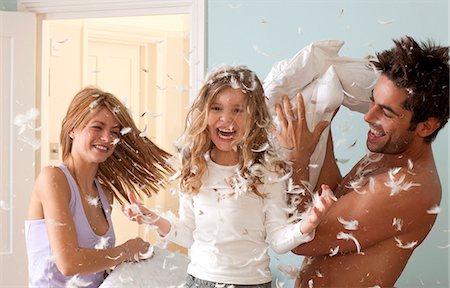 simsearch:649-03770663,k - family having pillow fight Stock Photo - Premium Royalty-Free, Code: 649-03010133