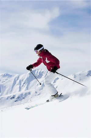 simsearch:649-03857163,k - Woman in red & white outfit off-piste. Stock Photo - Premium Royalty-Free, Code: 649-03077594