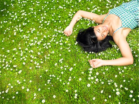 Woman resting in the garden Stock Photo - Premium Royalty-Free, Code: 649-03077908