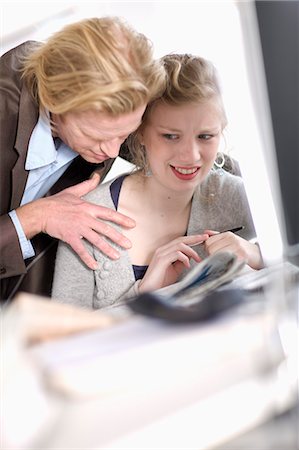 dominating woman - sexual harassment in office Stock Photo - Premium Royalty-Free, Code: 649-03153546