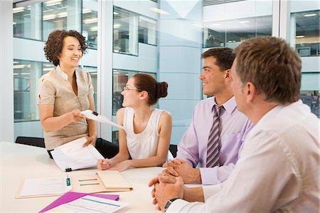 simsearch:614-03507042,k - A senior female heads business meeting Stock Photo - Premium Royalty-Free, Code: 649-03153994