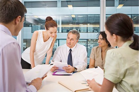 simsearch:6113-06899132,k - A corporate business meeting Stock Photo - Premium Royalty-Free, Code: 649-03153998